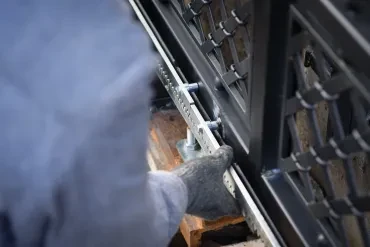 Close-up of gate hardware and welding detail