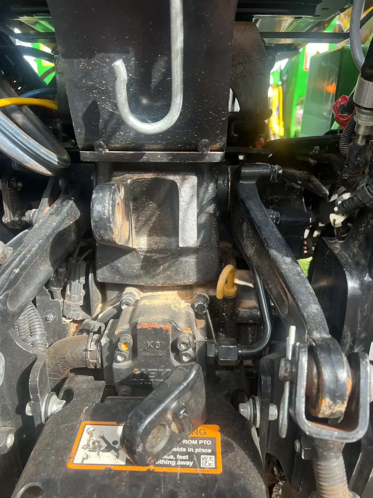 Engineered new hydraulic connector steel bracket on John Deere tractor
